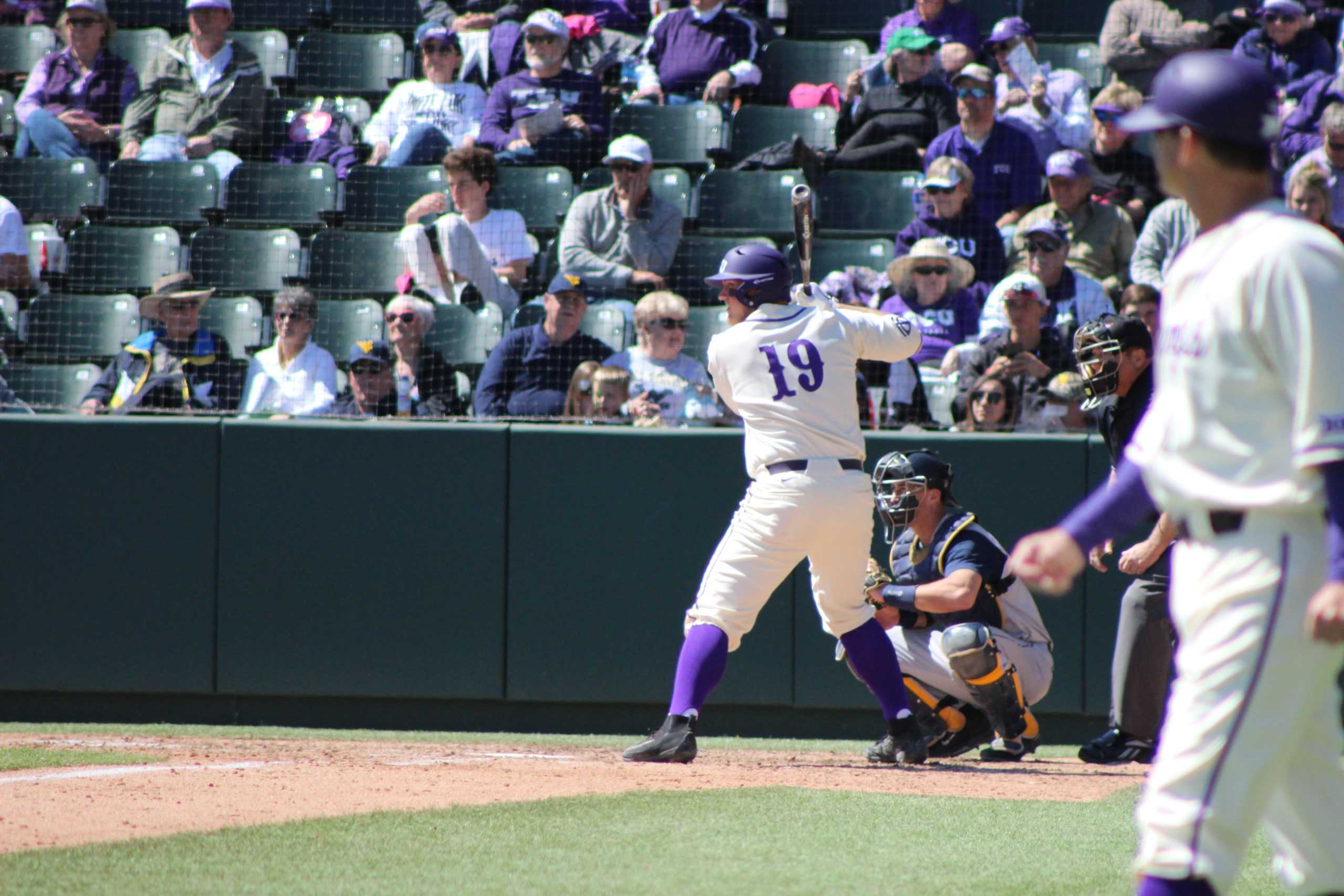 Luken Baker takes first base