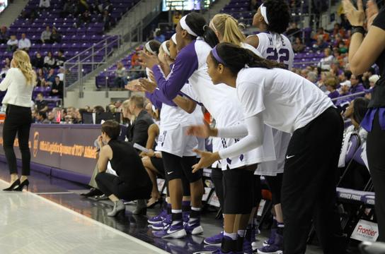 TCU Horned Frogs cheer each other on throughout the game.